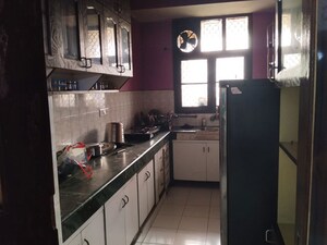 Kitchen in 2 BHK Apartment at Amrapali Heartbeat City, Sector 107 – for Rent
