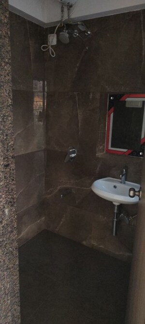 Bathroom in 2 BHK Apartment at Konark Zen Gardens, Kandivali West – for Rent