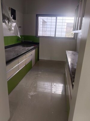 Kitchen in 2 BHK Apartment at Pate Manas, Model Colony – for Rent