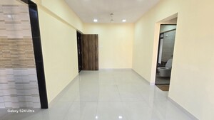 Living Room in 2 BHK Apartment at Ashirwad Apartment Malad West, Malad West – for Rent