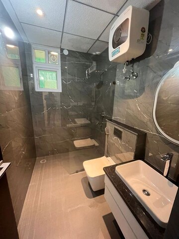 Bathroom in 4 BHK Apartment at Maya Green Lotus Utsav, International Airport Road – for Sale