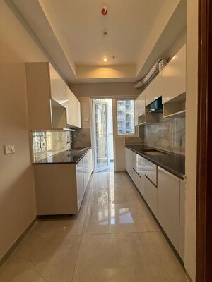 Kitchen in 3 BHK Apartment at T Homes Phase 1, Siddharth Vihar – for Sale