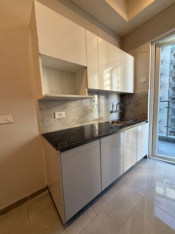 Kitchen in 3 BHK Apartment at T Homes Phase 1, Siddharth Vihar – for Sale