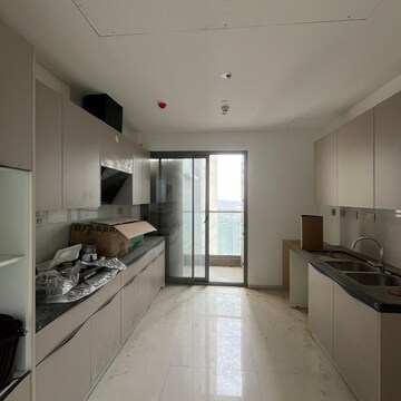 Kitchen in 4 BHK Apartment at Rustomjee Crown, Gokhale Road – for Rent