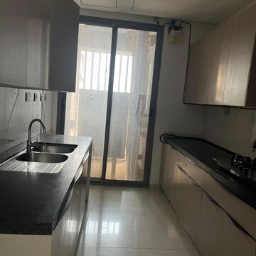 Kitchen in 4 BHK Apartment at Rustomjee Crown, Gokhale Road – for Rent
