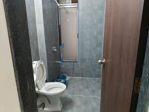 Bathroom in 2 BHK Apartment at Acme Ozone, Manpada – for Rent