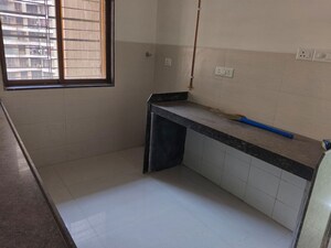 Kitchen in 2 BHK Apartment at Acme Ozone, Manpada – for Rent