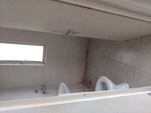 Bathroom in 2 BHK Apartment at Conscient Habitat 78, Sector 78 – for Rent
