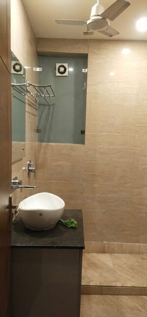 Bathroom in 4 BHK Builder Floor at DLF Queens Court, Chittaranjan Park – for Rent