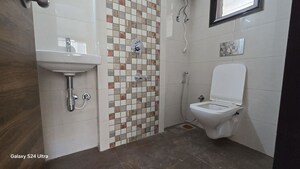 Bathroom in 1 BHK Apartment at Modispaces Amizarna, Malad West – for Rent