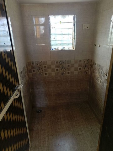 Bathroom in 1 BHK Apartment at Kashinath Park, Kalwa – for Rent