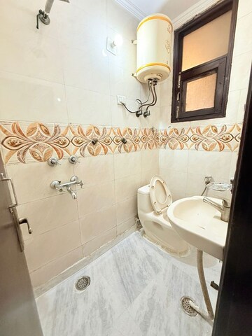 Bathroom in 1.5 BHK Builder Floor at Chattarpur – for Rent