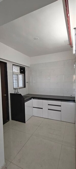 Kitchen in 1 BHK Apartment at Guru Vista CHS, Kharadi – for Rent
