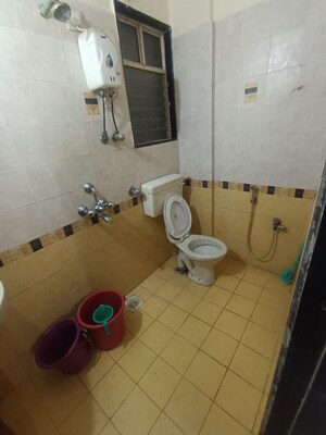Bathroom in 1 BHK Apartment at Bhoomi Park, Malad West – for Rent