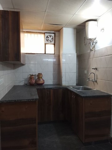 Kitchen in 1.5 BHK Builder Floor at Empire Floors, Sector 57 – for Rent