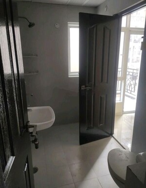 Bathroom in 3 BHK Apartment at JM Aroma, Sector 75 – for Sale