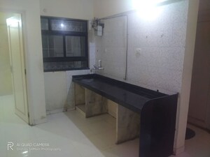 Kitchen in 2 BHK Apartment at Guru Ganesh Housing Society, Katraj – for Rent
