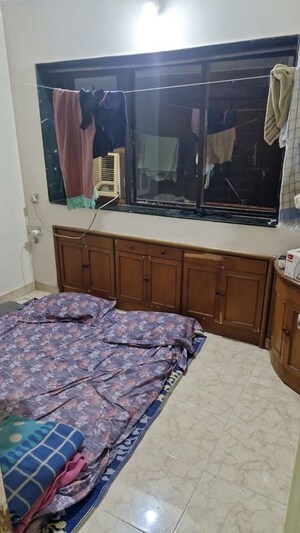 Bedroom in 1 BHK Apartment at Lokhandwala Vinay Tower, Kandivali East – for Sale