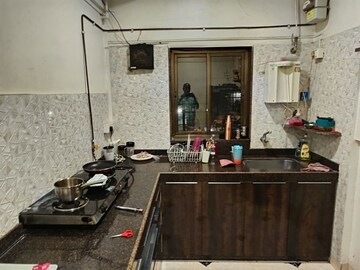 Kitchen in 1.5 BHK Apartment at Eff Jumbo Darshan CHS, Andheri East – for Rent