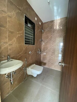 Bathroom in 2 BHK Apartment at MJ Shah Centrio, Govandi – for Rent