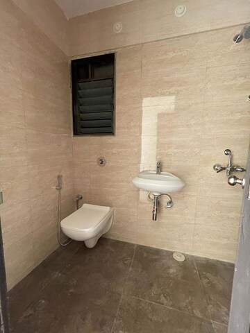 Bathroom in 2 BHK Apartment at MJ Shah Centrio, Govandi – for Rent