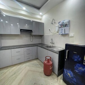 Kitchen in 2 BHK Apartment at Global Foyer, Golf Course Road – for Rent