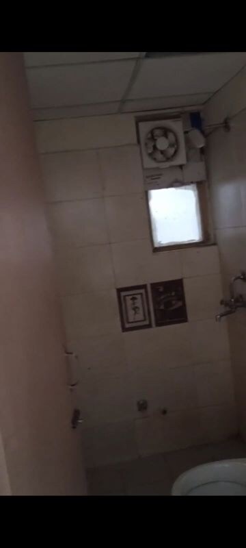 Bathroom in 2 BHK Apartment at Raj Nagar Extension – for Sale