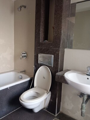 Bathroom in 3 BHK Apartment at Lodha Luxuria, Majiwada – for Rent