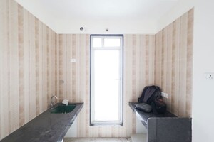 Kitchen in 1 BHK Apartment at Lodha Amara, Kolshet Road – for Sale