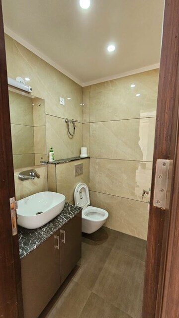 Bathroom in 4 BHK Builder Floor at DLF City Phase III, Sector 24 – for Rent