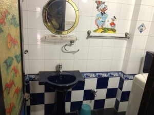 Bathroom in 2 BHK Apartment at Raheja Township, Malad East – for Rent