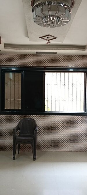 Bedroom in 1 BHK Apartment at Om Sai Charan CHS Dombivli, Dombivli West – for Sale