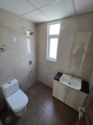 Bathroom in 2.5 BHK Builder Floor at Smart World Gems, Sector 89 – for Sale