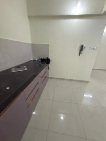 Kitchen in 2 BHK Apartment at Kolte Patil R10, Hinjewadi – for Rent