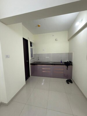 Kitchen in 2 BHK Apartment at Kolte Patil R10, Hinjewadi – for Rent