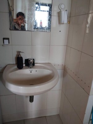 Bathroom in 2 BHK Apartment at Chandanbala Kutir CHS, Vile Parle East – for Rent
