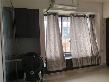 Living Room in 2 BHK Apartment at Chandanbala Kutir CHS, Vile Parle East – for Rent