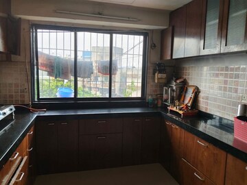 Kitchen in 2 BHK Apartment at Chandanbala Kutir CHS, Vile Parle East – for Rent