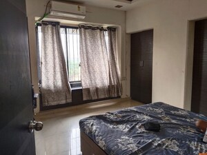 Bedroom in 2 BHK Apartment at Chandanbala Kutir CHS, Vile Parle East – for Rent
