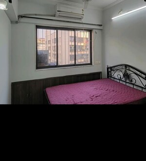 Bedroom in 2 BHK Apartment at Chandanbala Kutir CHS, Vile Parle East – for Rent