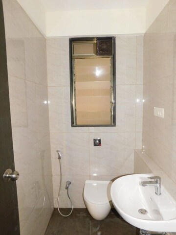 Bathroom in 2 BHK Apartment at Chandak 34 Park Estate, Goregaon West – for Rent