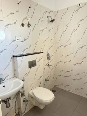 Bathroom in 3 BHK Apartment at Malwa Escon Primera, International Airport Road – for Rent