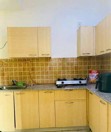 Kitchen in 2 BHK Apartment at Mahagun Mywoods II, Sector 16c Greater Noida – for Rent