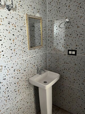 Bathroom in 3 BHK Builder Floor at Hansmukhi Garden Estate, Sahastradhara Road – for Rent