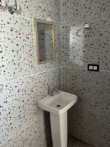 Bathroom in 3 BHK Builder Floor at Hansmukhi Garden Estate, Sahastradhara Road – for Rent