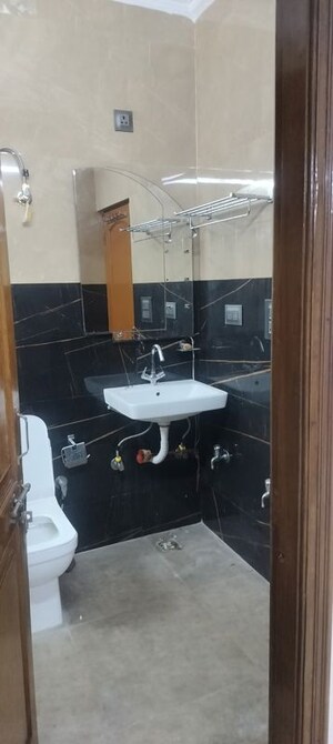 Bathroom in 4 BHK Builder Floor at Janakpuri – for Rent