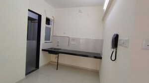 Kitchen in 2 BHK Apartment at Kolte Patil R10, Hinjewadi – for Rent