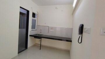 Kitchen in 2 BHK Apartment at Kolte Patil R10, Hinjewadi – for Rent