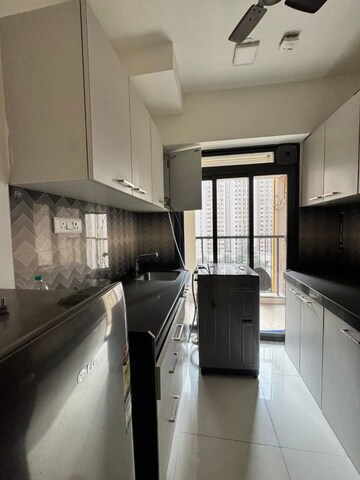 Kitchen in 2 BHK Apartment at Lodha Splendora, Ghodbunder Road – for Rent