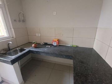 Kitchen in 2 BHK Apartment at Tata Eureka Park, Sector 150 – for Rent